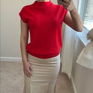 Mock neck sleeveless knit top. XS/S